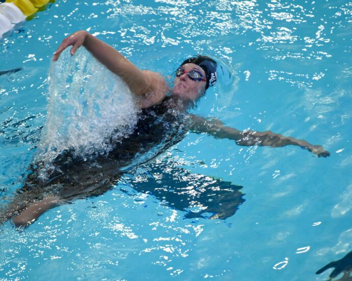 Army Sergeant First Class Elizabeth Marks swims the backstroke during the U.S. Paralympic Team Trials in June 2024.